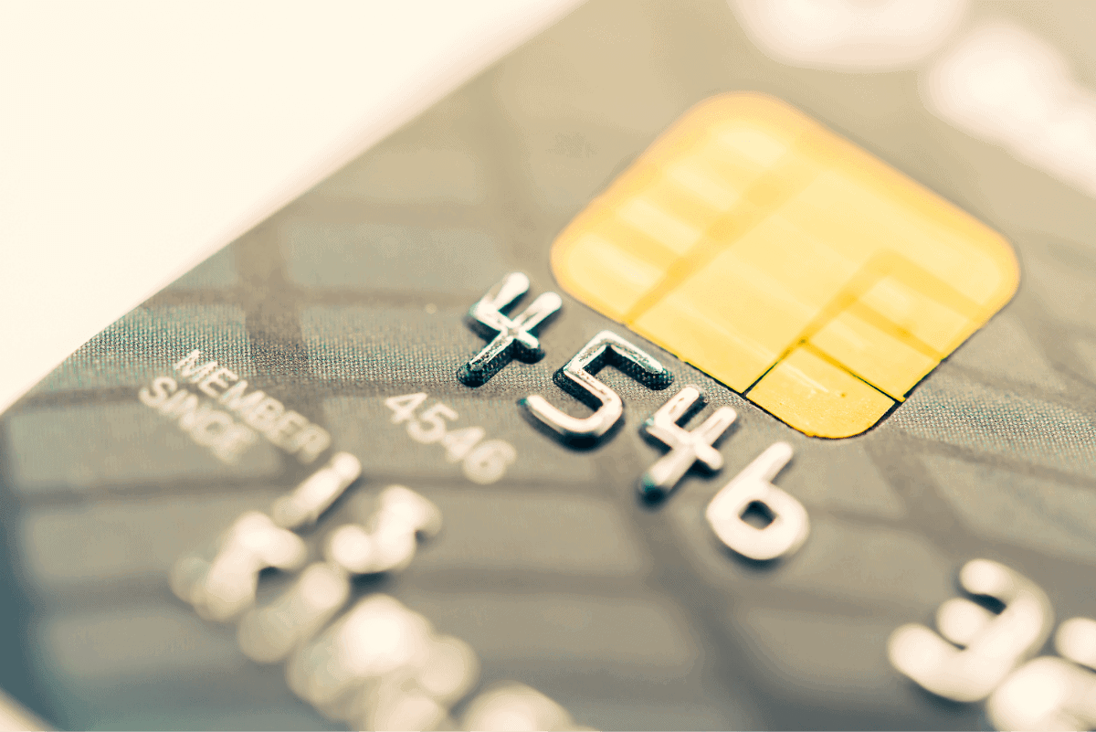 Photo of the EMV chip and first four digits of a credit card.